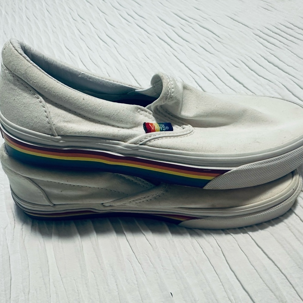 Vans White Slip-On Sneakers with Rainbow Stripe